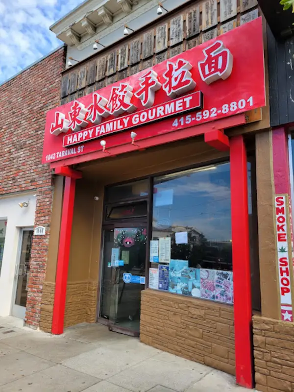 Red Storefront Entrance in Daytime